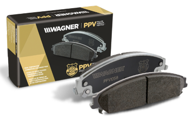 Two Wagner PPV brake pads sitting in front of the box they came in