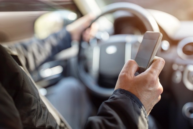 Driver-Checking-Smartphone Driver-Checking-Smartphone