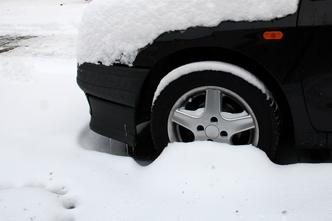 Car-Stuck-In-Snow-Close-Up-Of-Tire Car-Stuck-In-Snow-Close-Up-Of-Tire