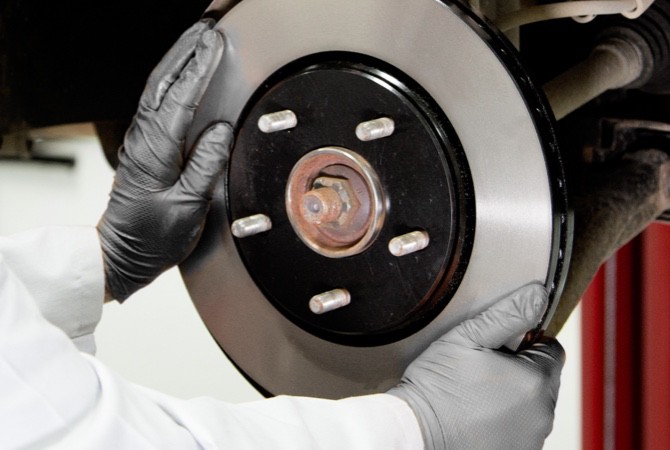 technician-inspecting-rotors-tip-3 technician-inspecting-rotors-tip-3